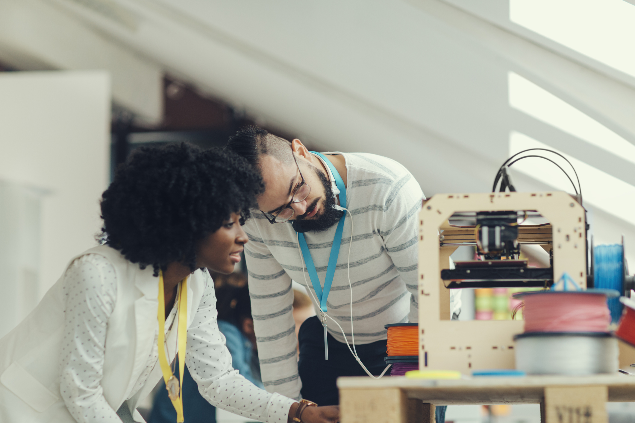 Business Team Working by 3D Printer