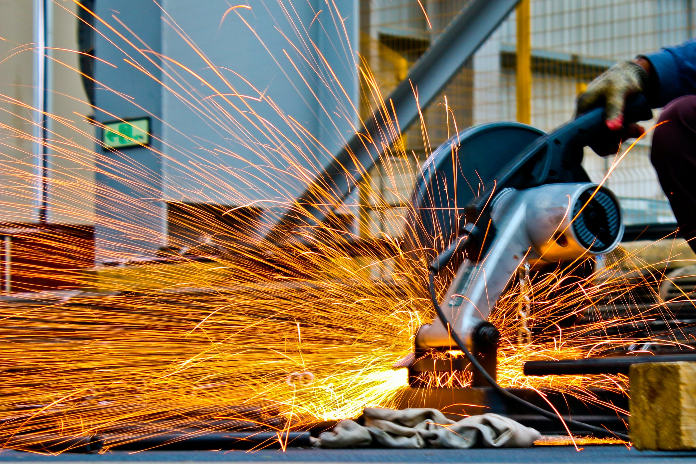 Industrial cutting machine with sparks flying