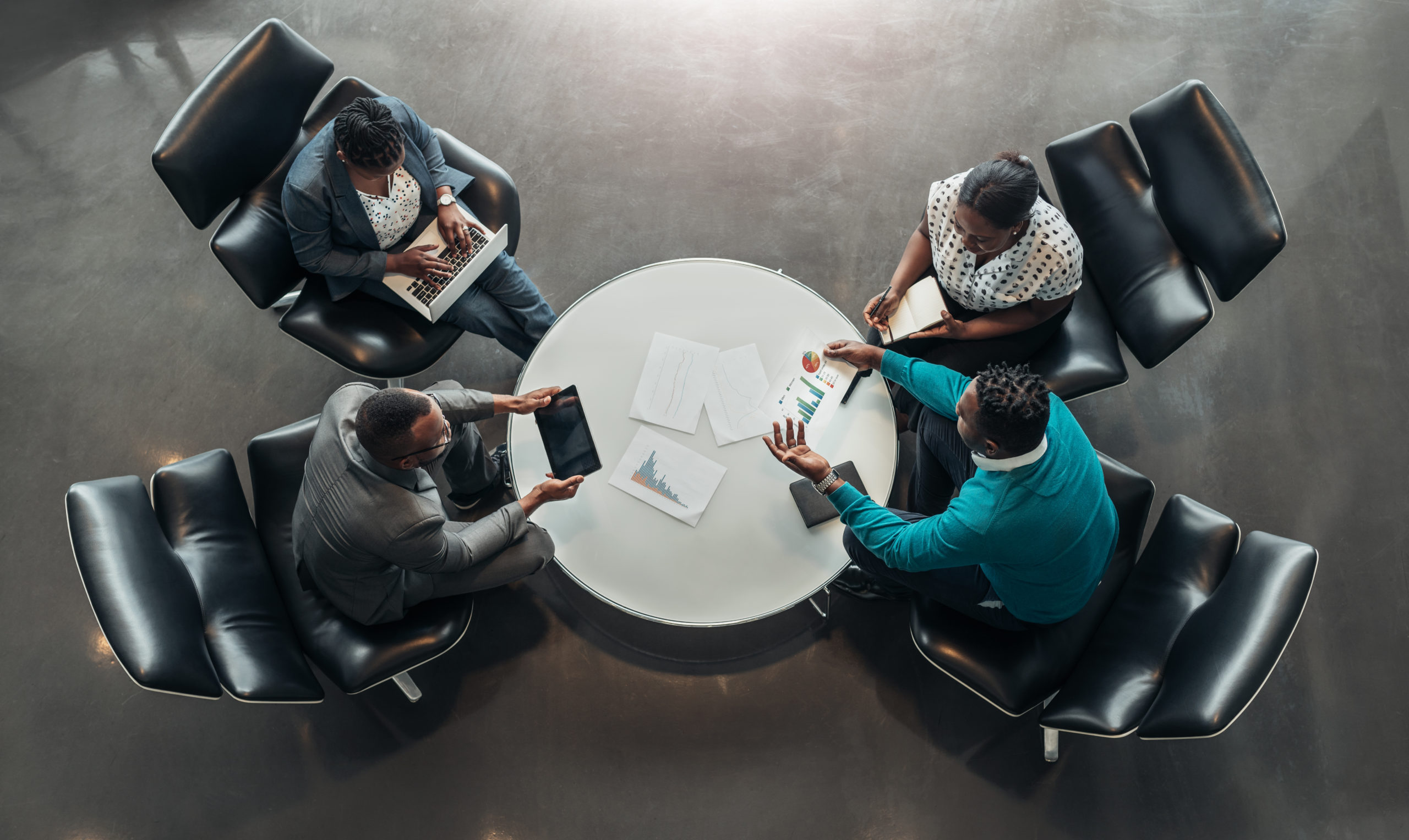 people discussing around a table