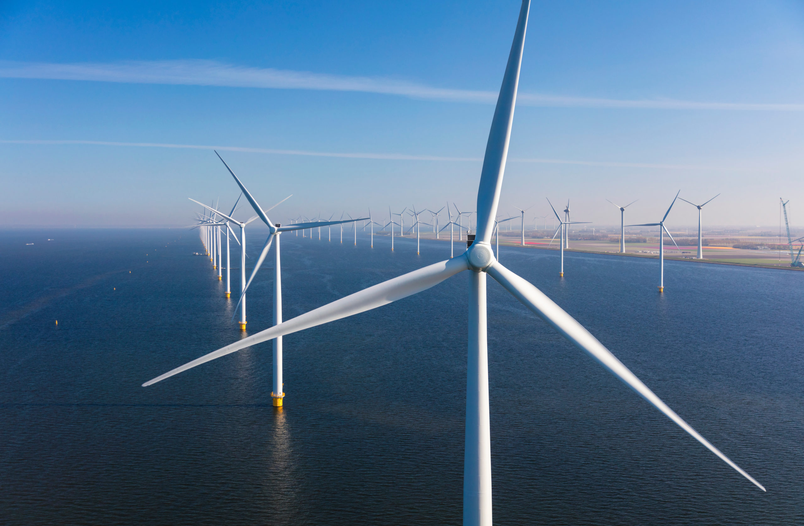 Aerial view of wind turbines at sea, North Holland, Netherlands